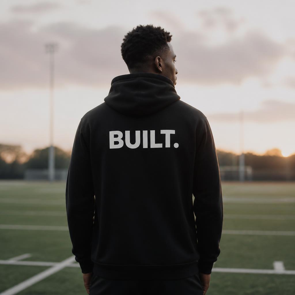 Athlete wearing a BUILT hoodie from behind